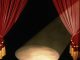 Theatre stage with red curtains